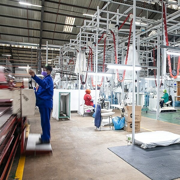 Romatex factory floor with equipment to manufacturer stitch-bonded non-woven materials