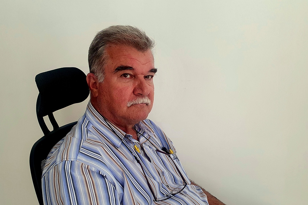 Romatex general manager of operations, Helmut Hock, sitting at his desk
