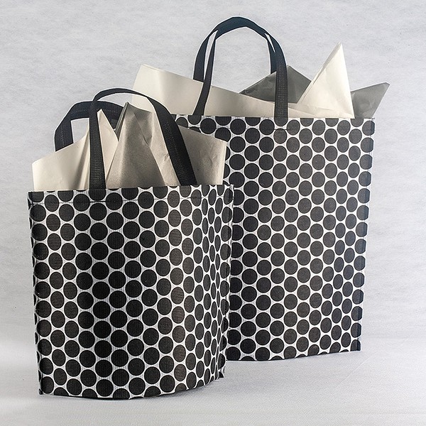Supermarket shopping bags made from recycled material
