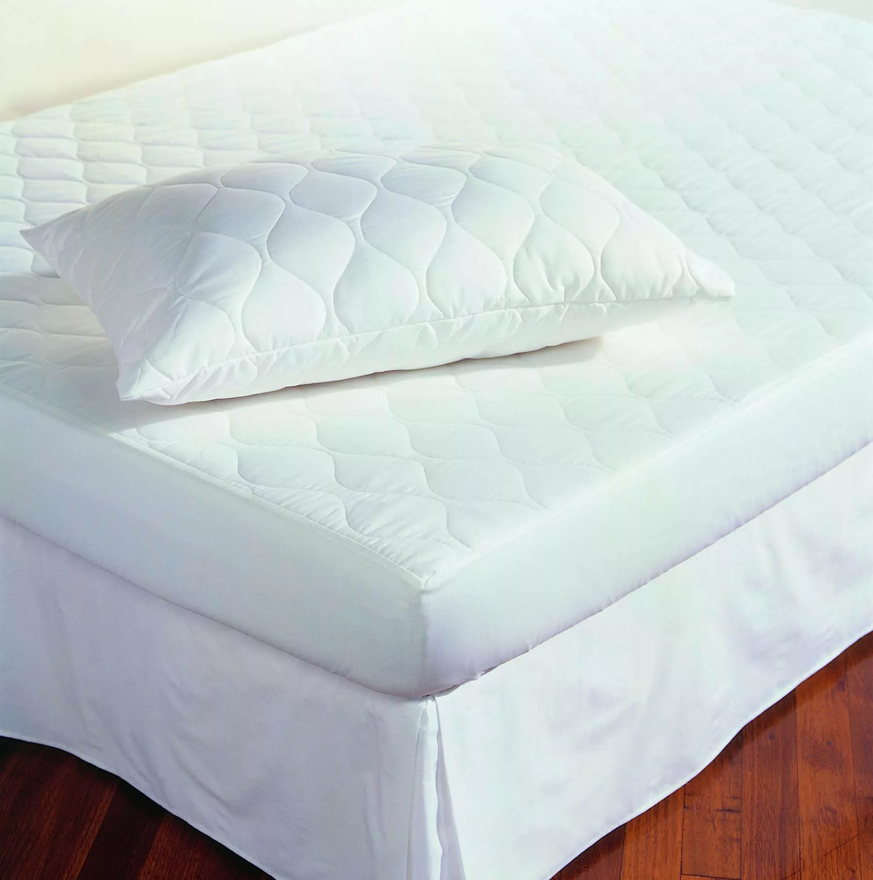 mattress and pillow protectors on a bed