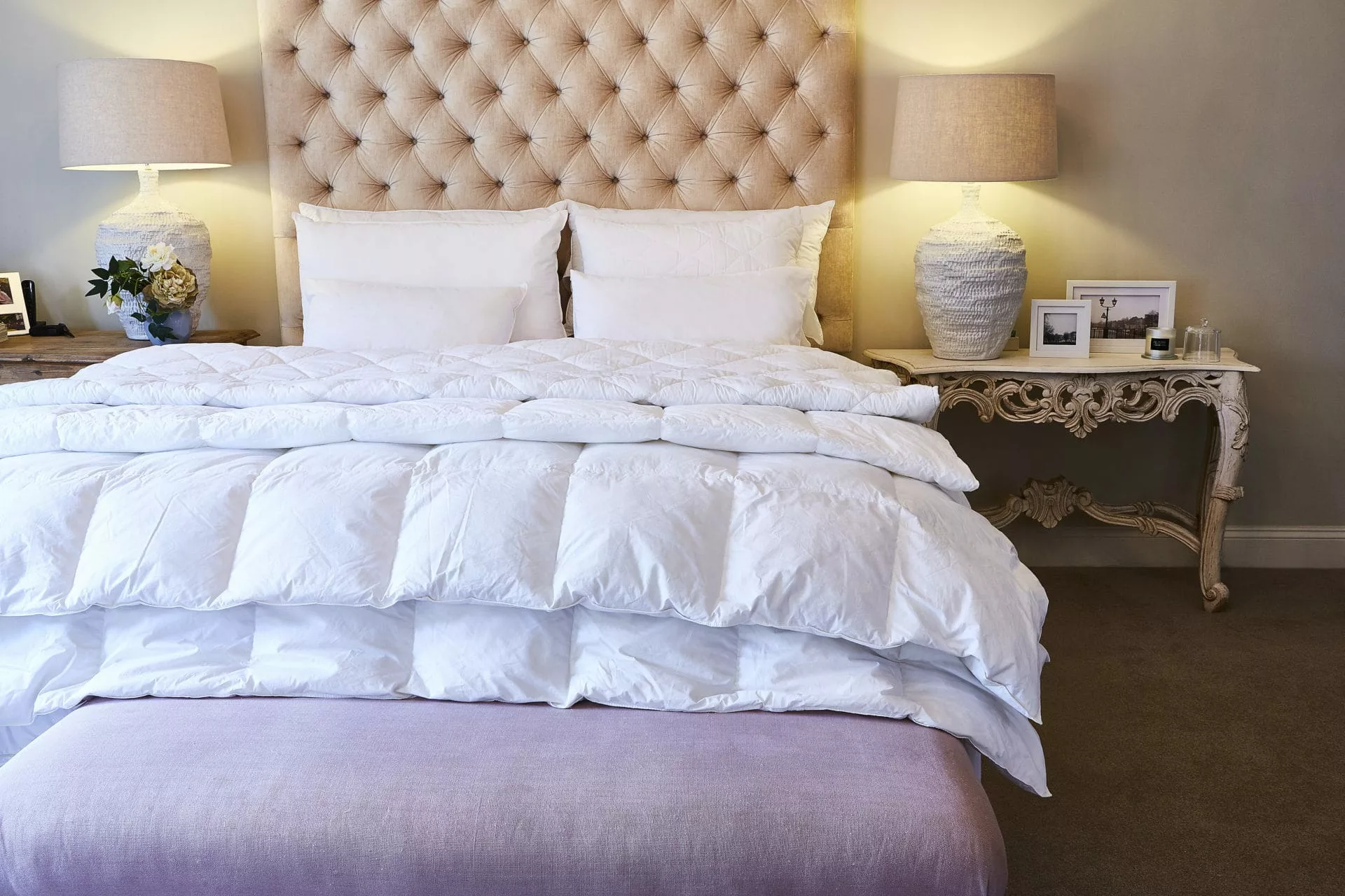 a bed with locally manufactured duvet inners